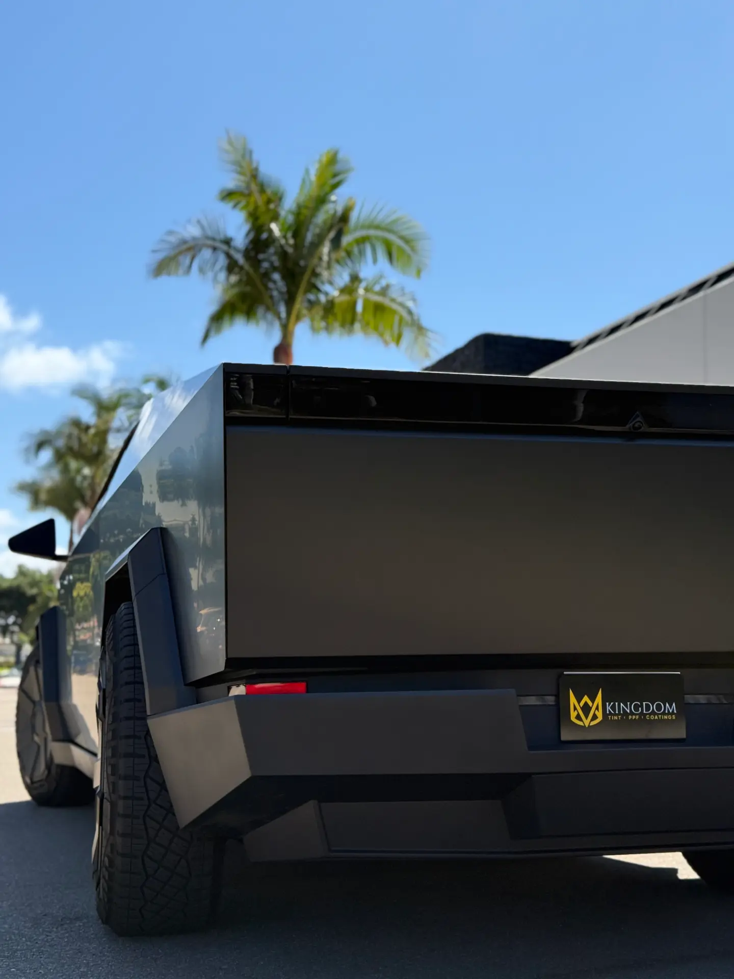 Rear of a protected Tesla Cybertruck with a Kingdom Tint plate frame